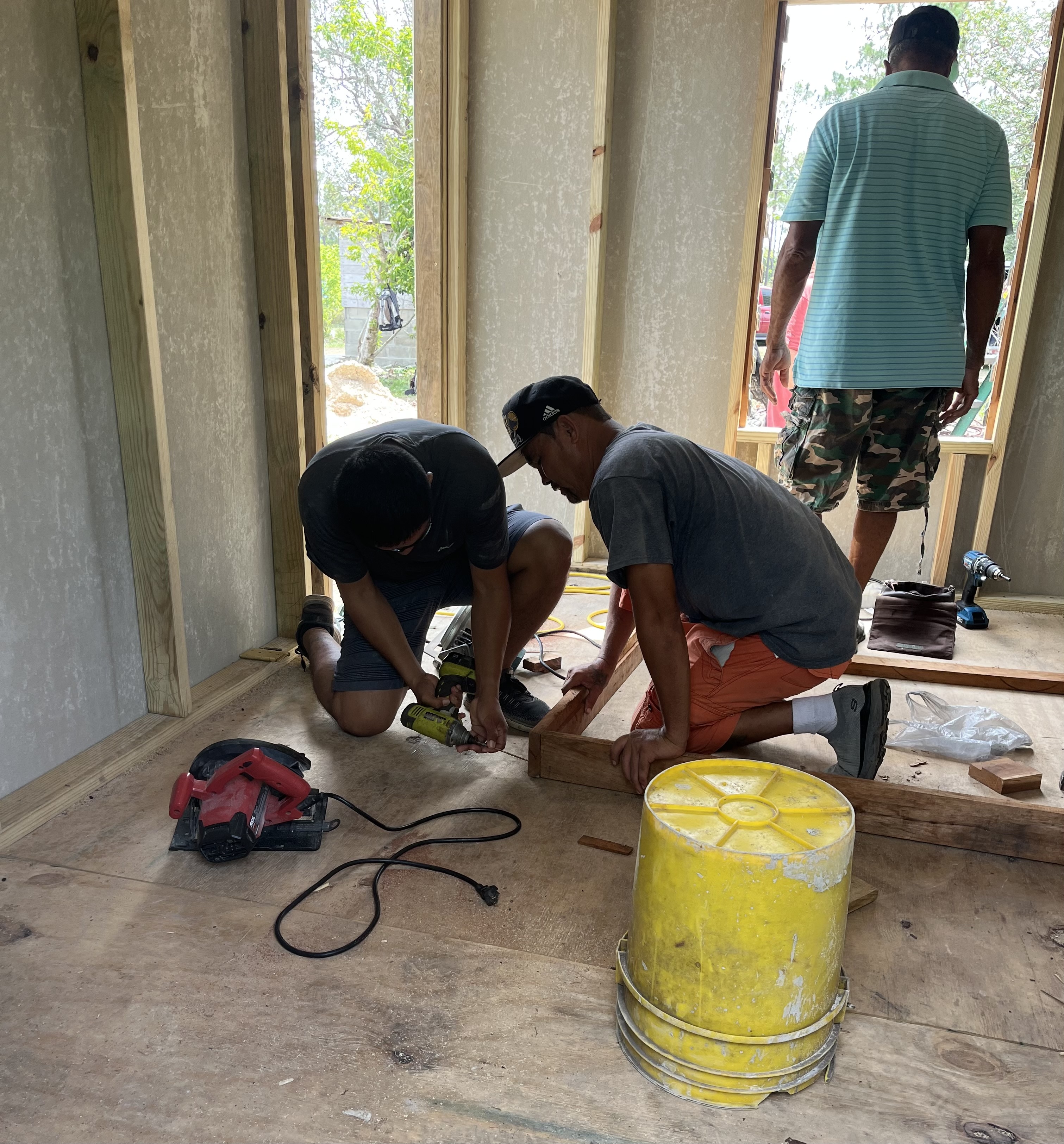 People working on a construction site.